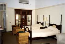Bedroom in the Victoria Falls Hotel - www.countrybagging.com